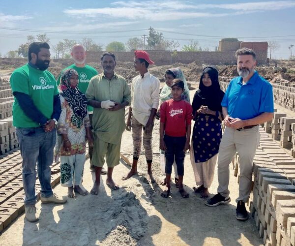 Vital Solutions Work in Pakistan, Vital Solutions Team, small group photo, outdoors.